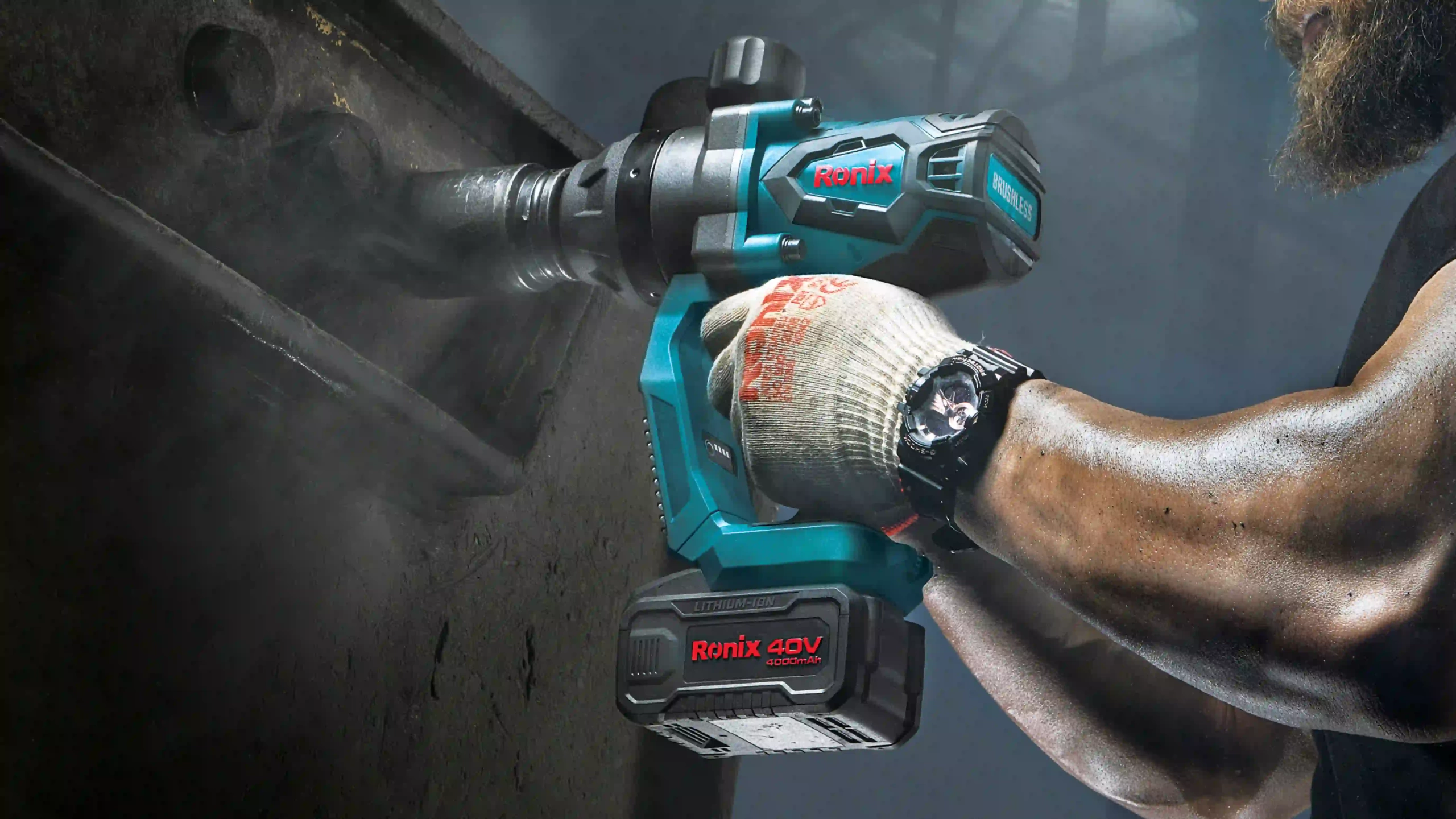 picture of a man using the Ronix 8937 Brushless Cordless Impact Wrench Kit