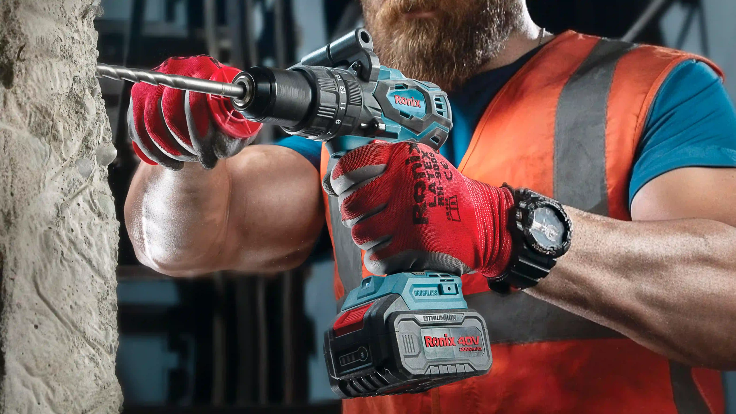 picture of a man using the Ronix 8905 Brushless Cordless Impact Drill Kit