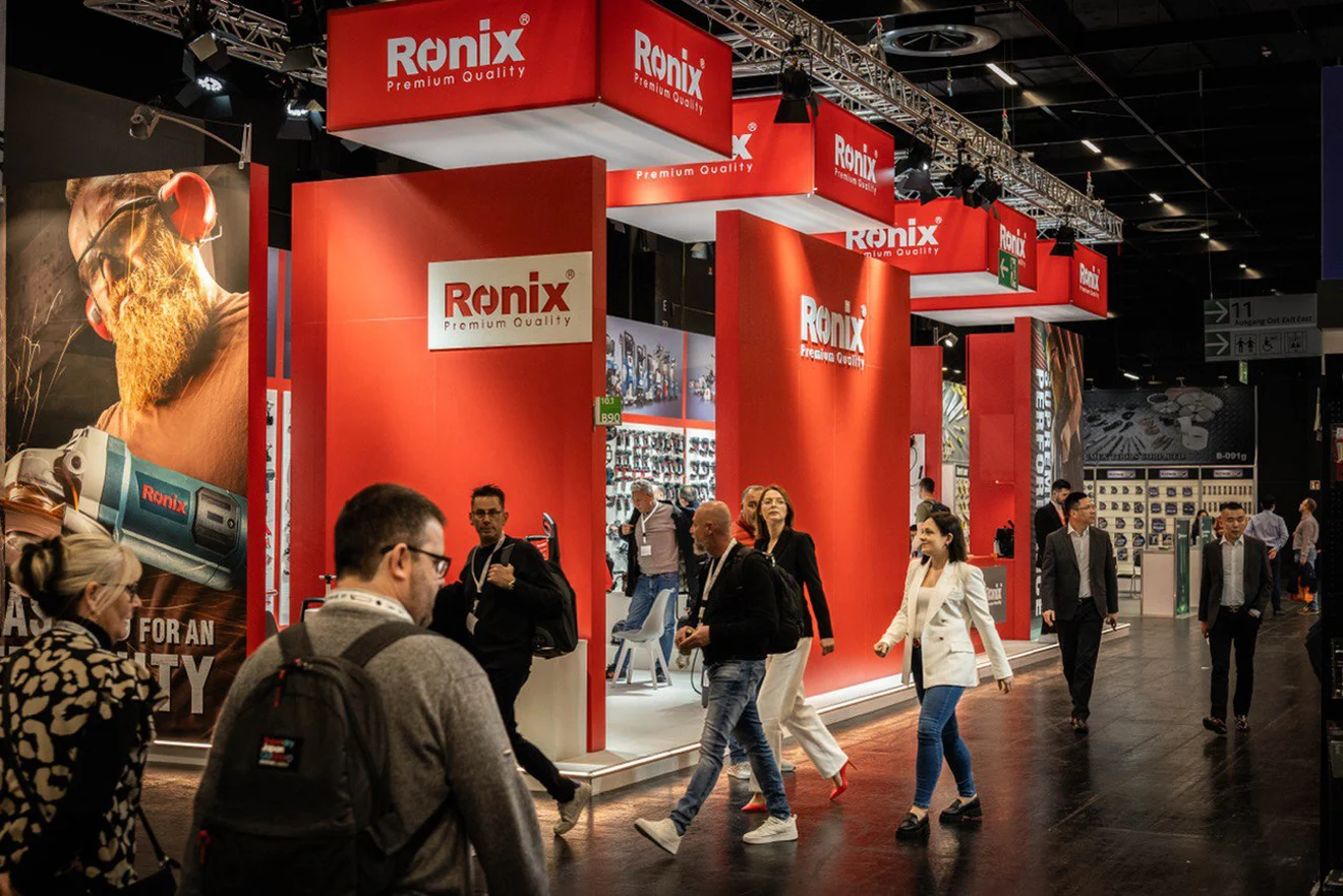 A photo of the crowd of people before and inside the Ronix booth