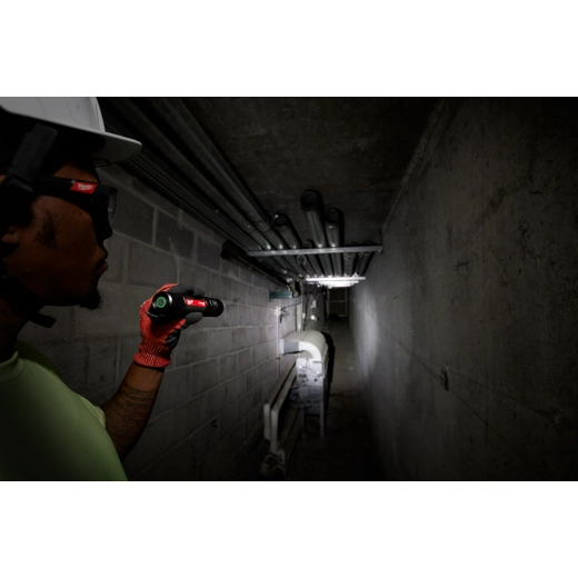 a picture of a man using The Milwaukee Red lithium