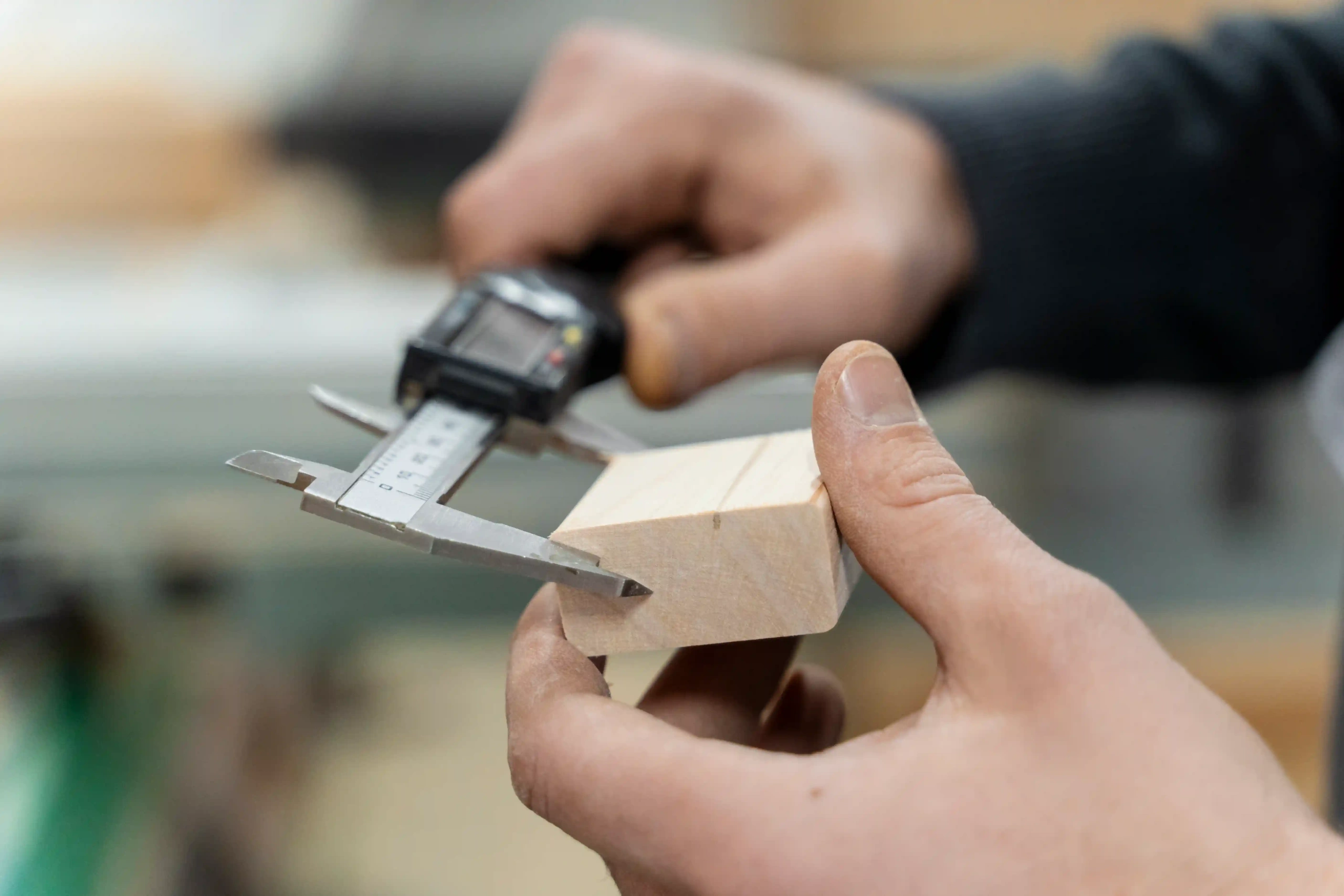 Picture of a person using a caliper
