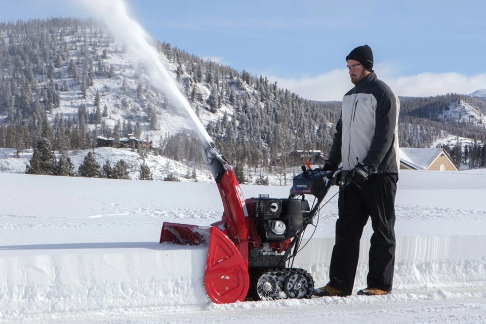 picture of a person using a snow blower